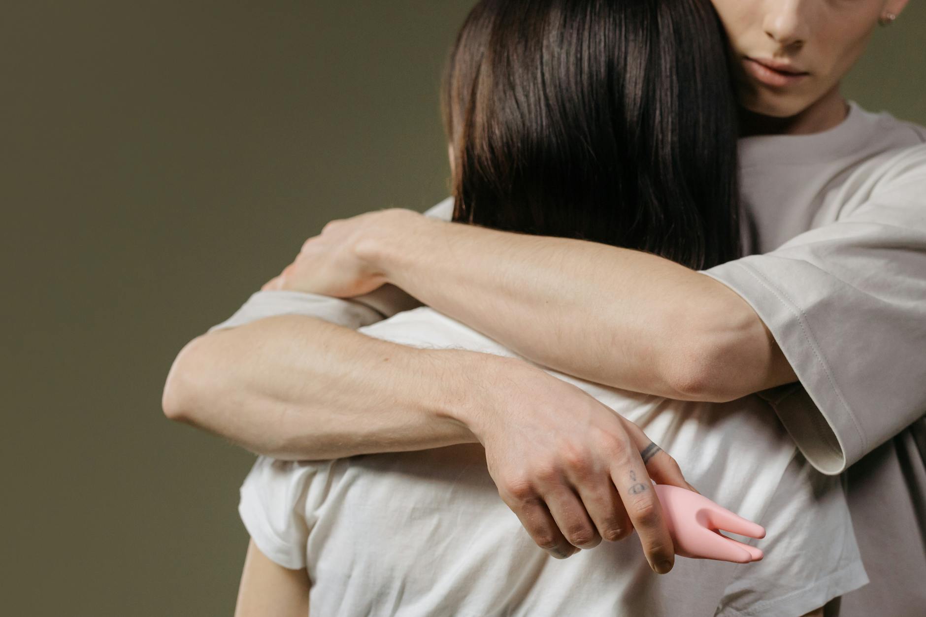A couple embracing and reconnecting, showing physical intimacy after working through relationship betrayal.